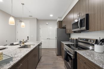 Quartz countertops & tile backsplash